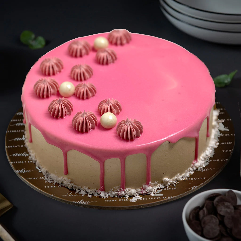 Smooth Pink Cake with Chocolate Drip and Chocolate Toppings - The Girl on  the Swing