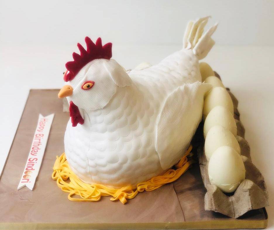 Hen Laying Eggs Theme Cake