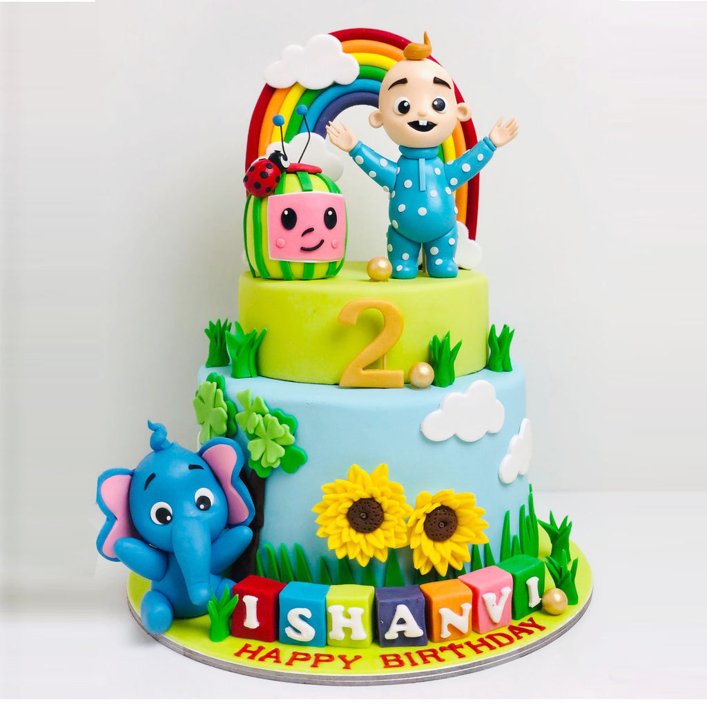 Coco Melon and cute elephant theme cake